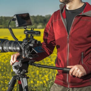 Videographer Operator with Professional Digital Camera